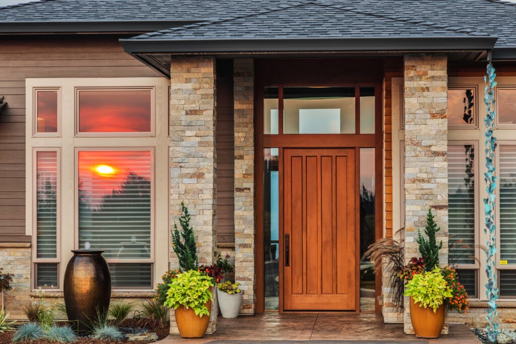 Home 1 dallas area front door to a brick home with a water feature